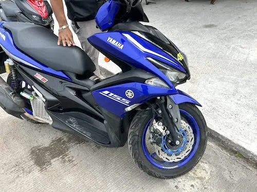 Right side of Yamaha Aerox rental motorbike in Krabi, Thailand.