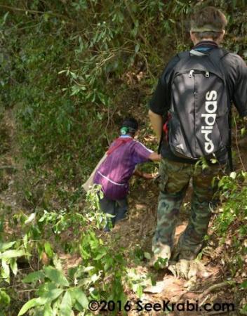 A dirt path on a treacherous hill leading to Khao Phung Cave in Krabi, Thailand.